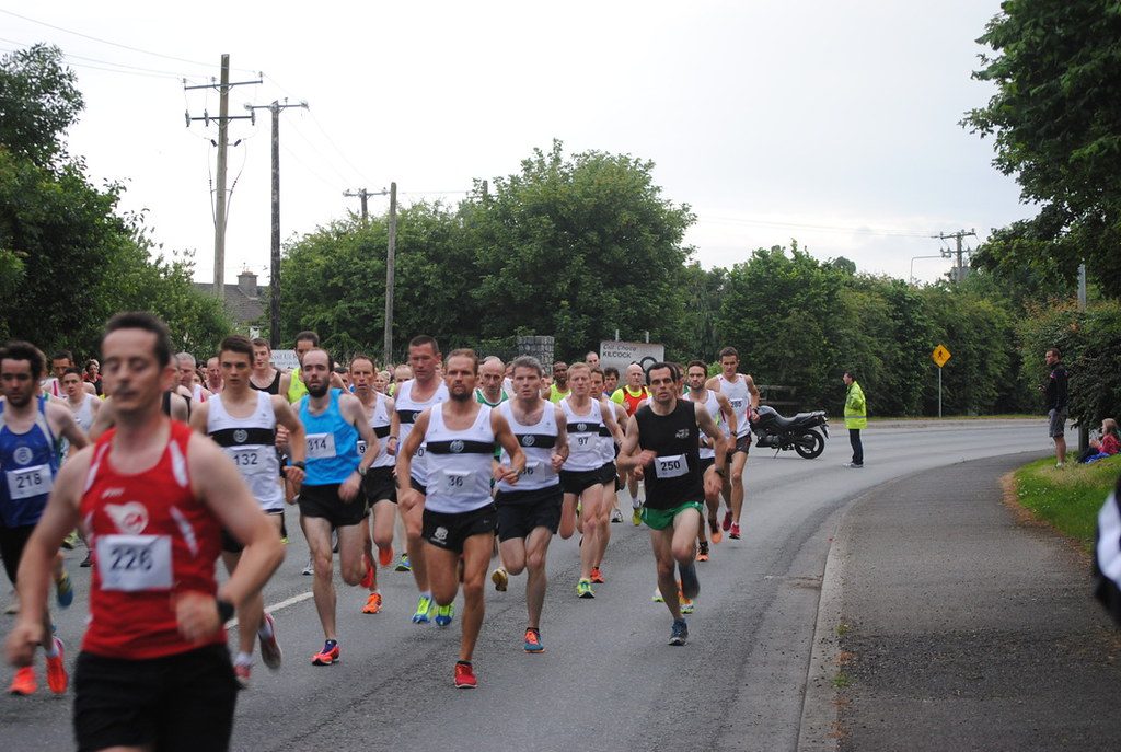 Runners in road race on country road