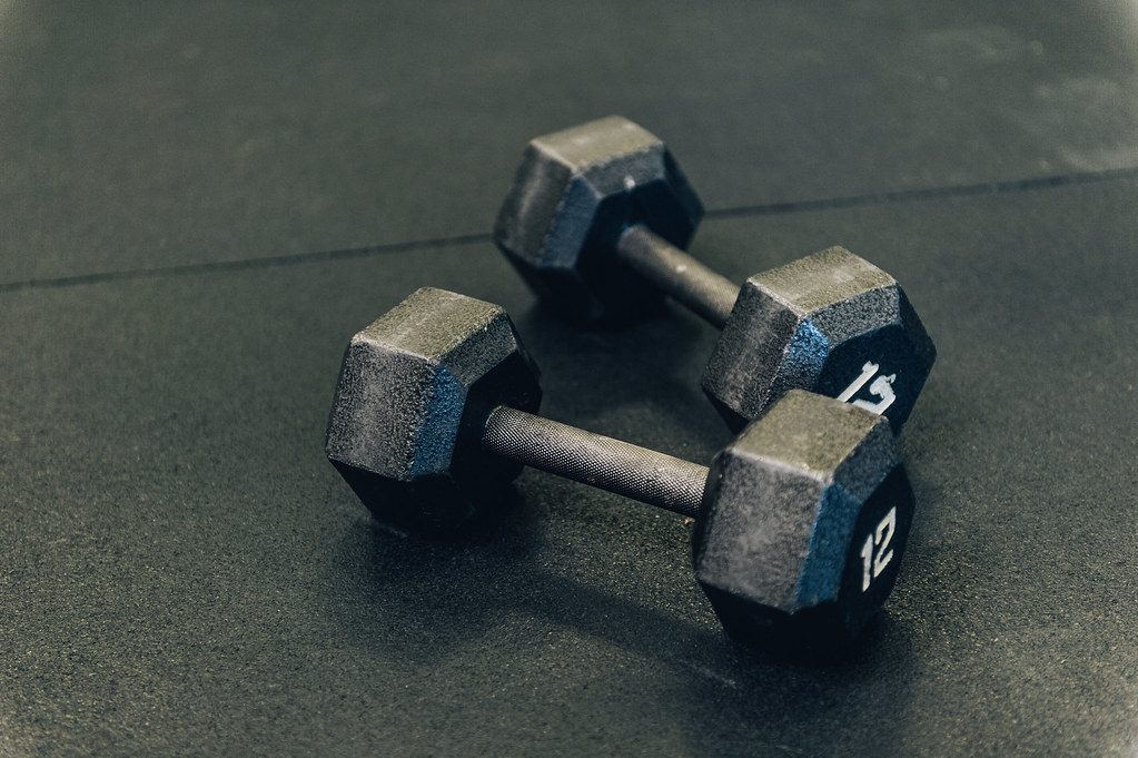 Pair of hex dumbbells on gym floor