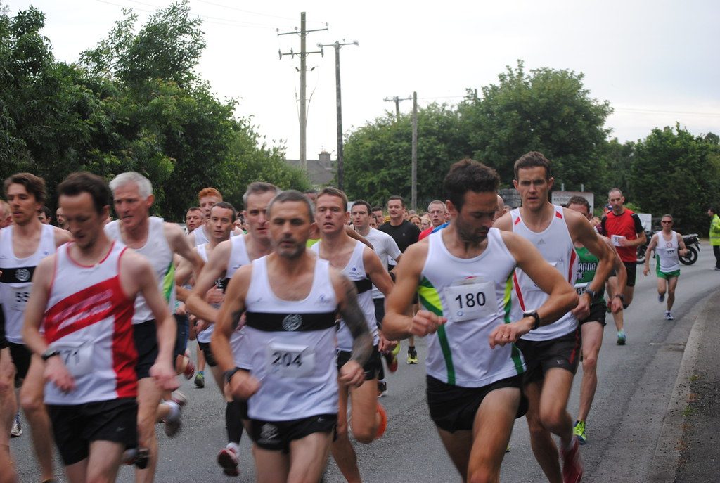 Pack of road race runners