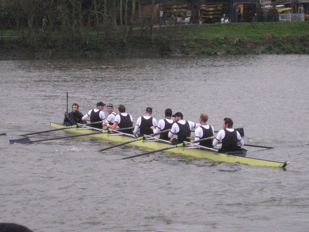 Rowing eight on river